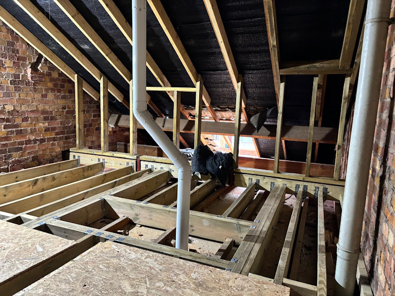 Loft floor and roof structure during construction
